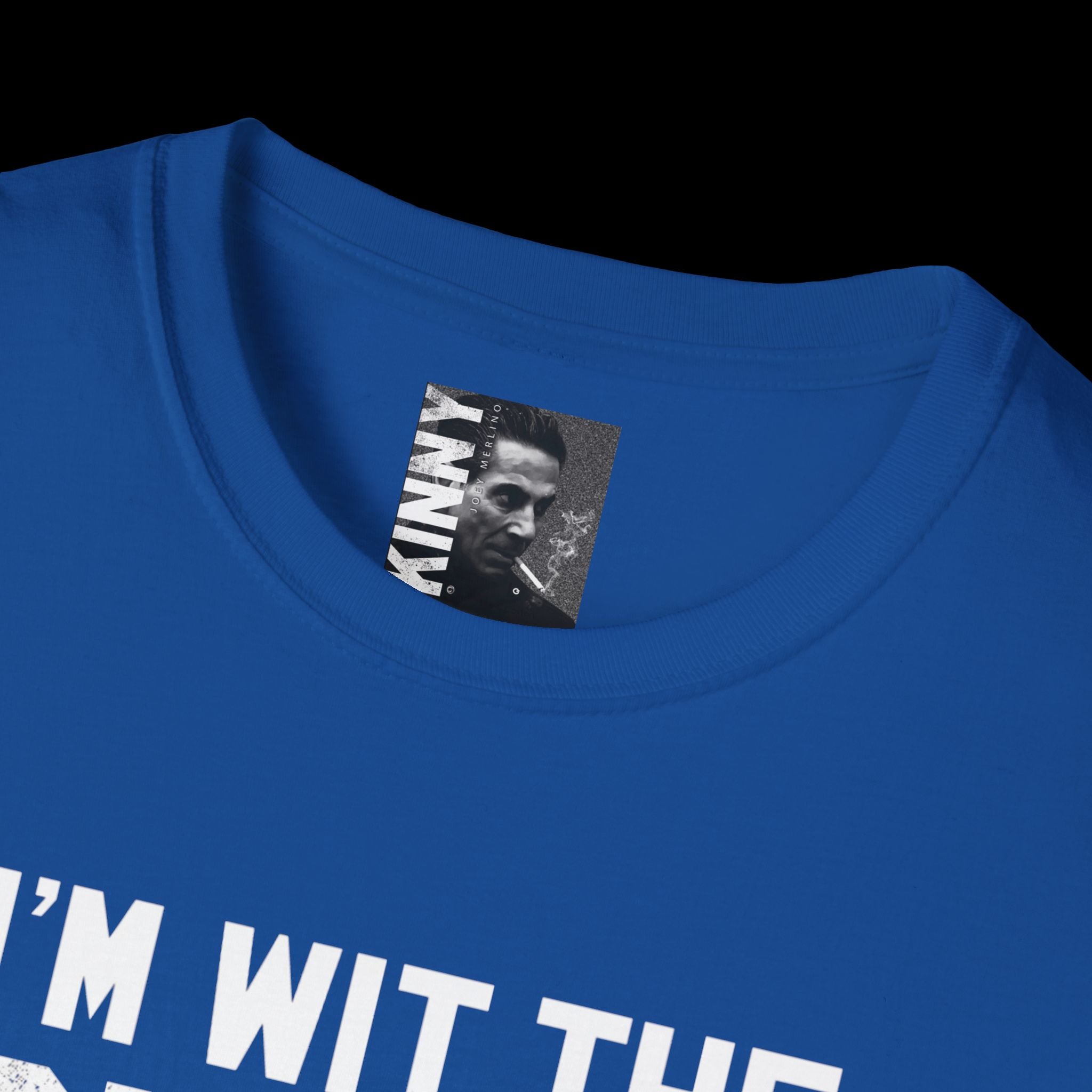 Blue t-shirt with a label featuring a black and white image of a person and text on a black background.