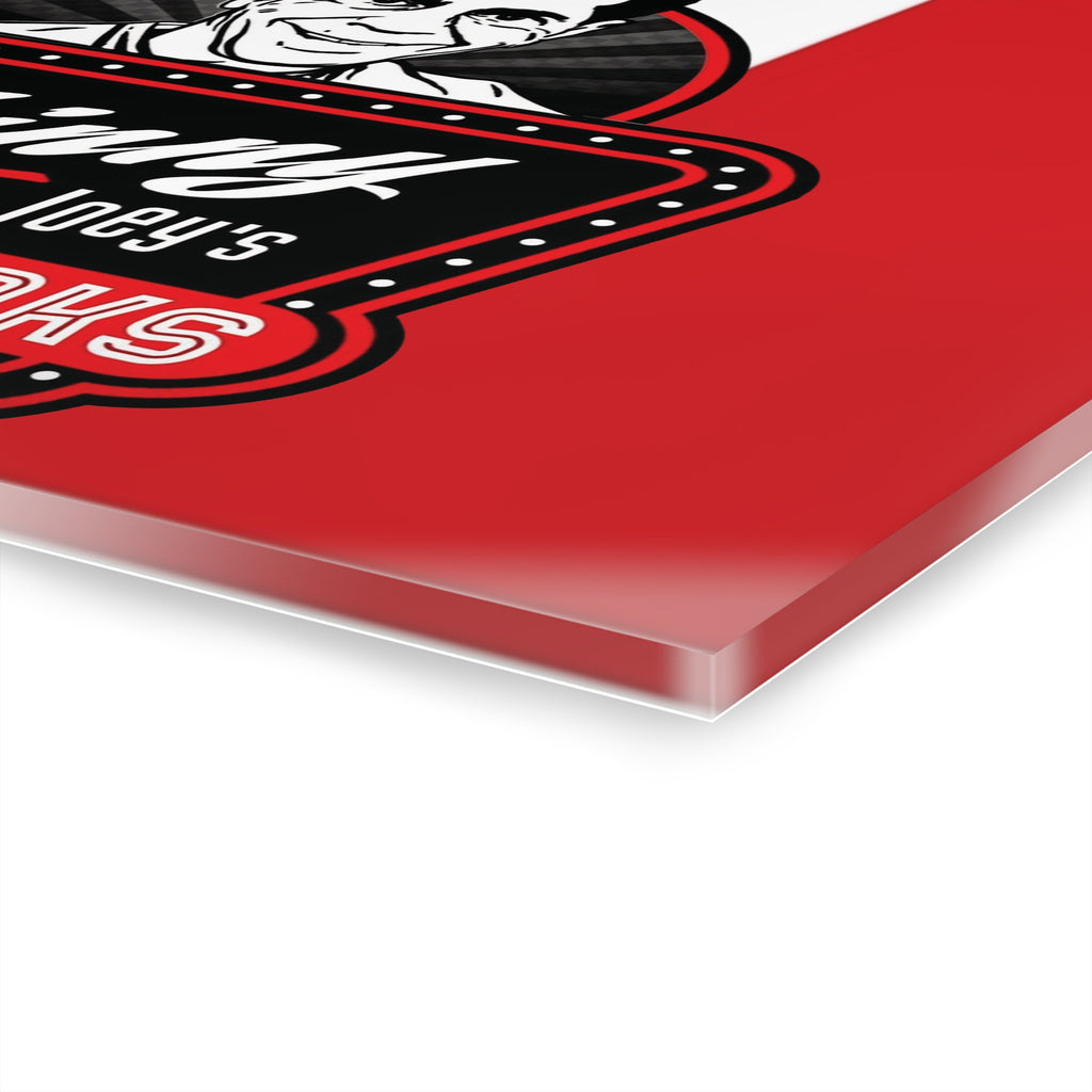 Close-up of a red surface with a black and white logo on a white background