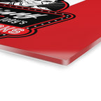 Close-up of a red surface with a black and white logo on a white background