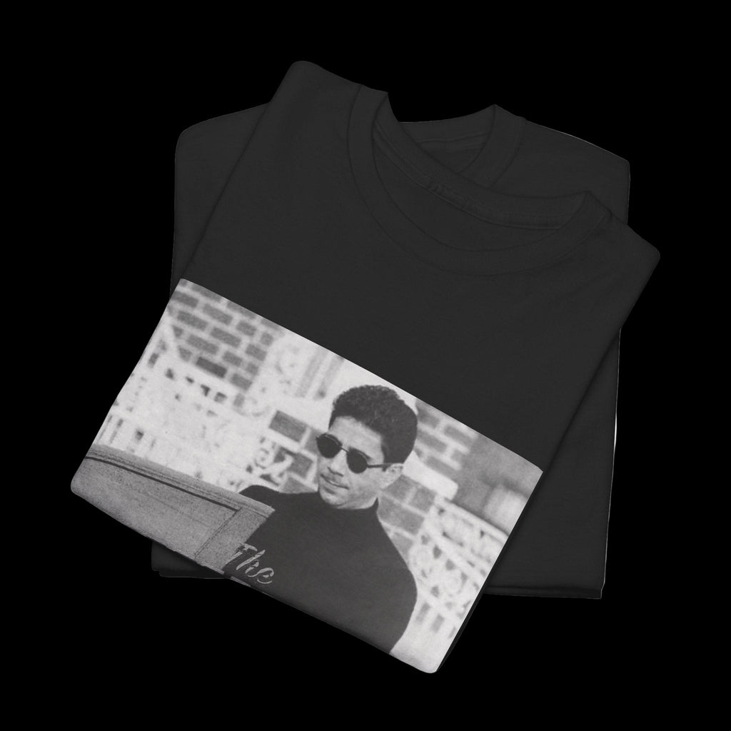 Black t-shirt with a graphic of a person wearing sunglasses on a white background