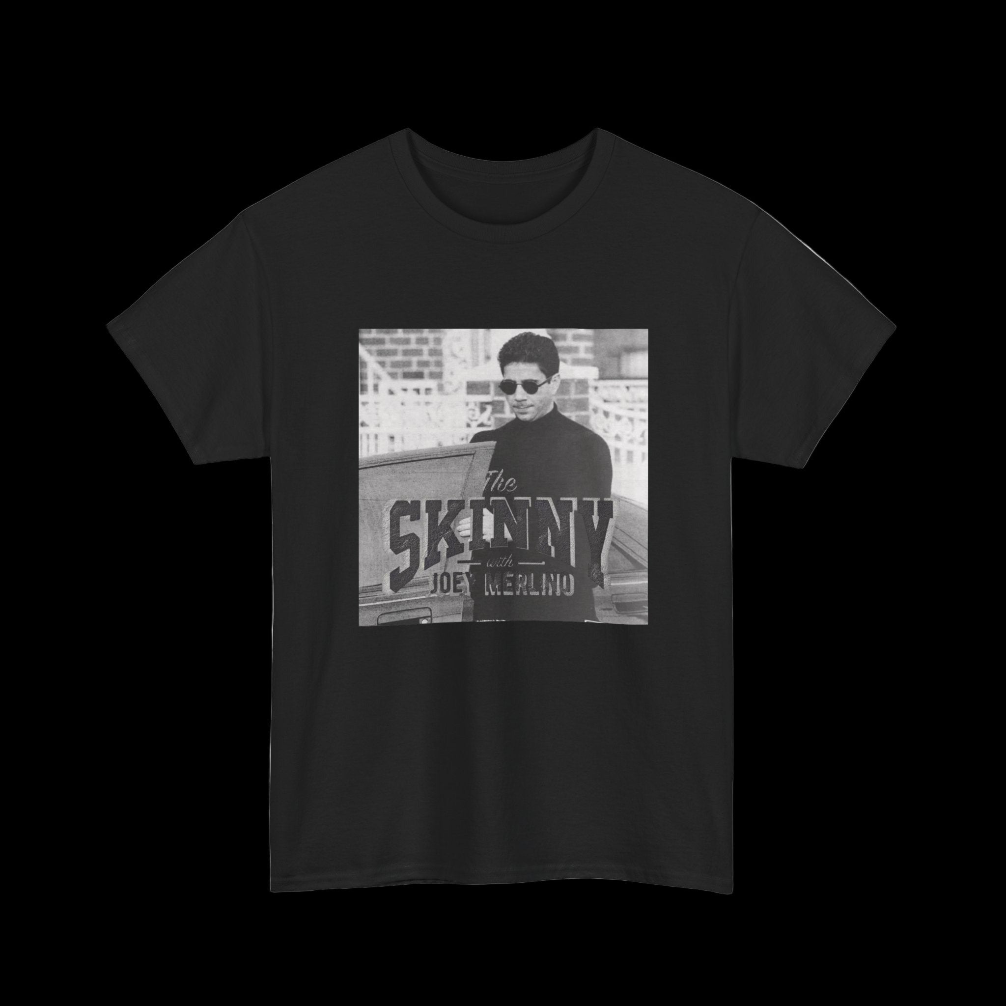 Black t-shirt with a graphic of a person and 'The Skinny' text on a white background