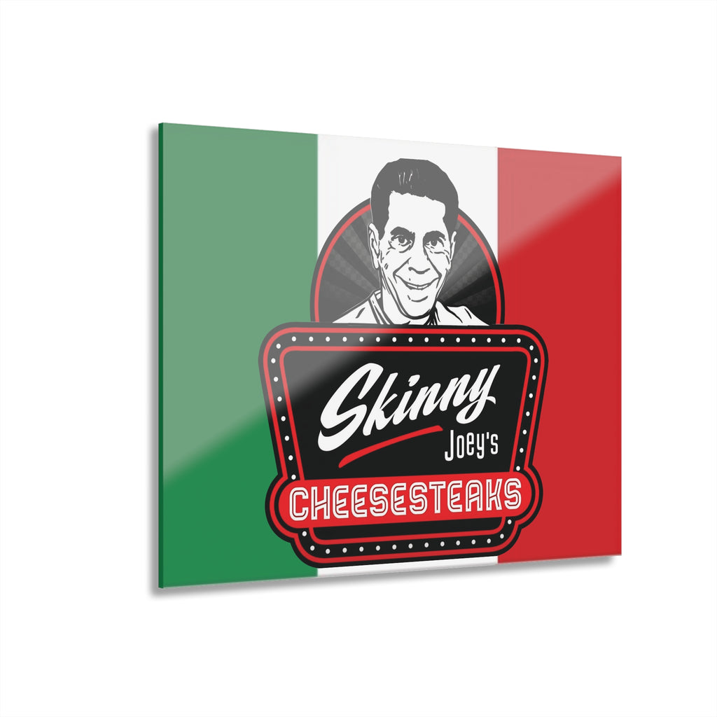 Metallic sign with 'Skinny Joey's Cheesesteaks' logo on a green, white, and red background