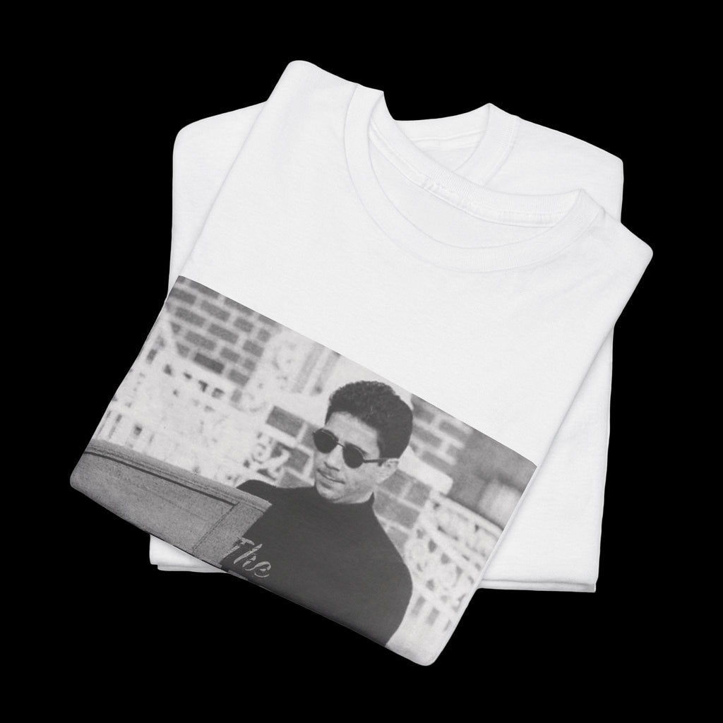 White t-shirt with a graphic of a person wearing sunglasses on a white background