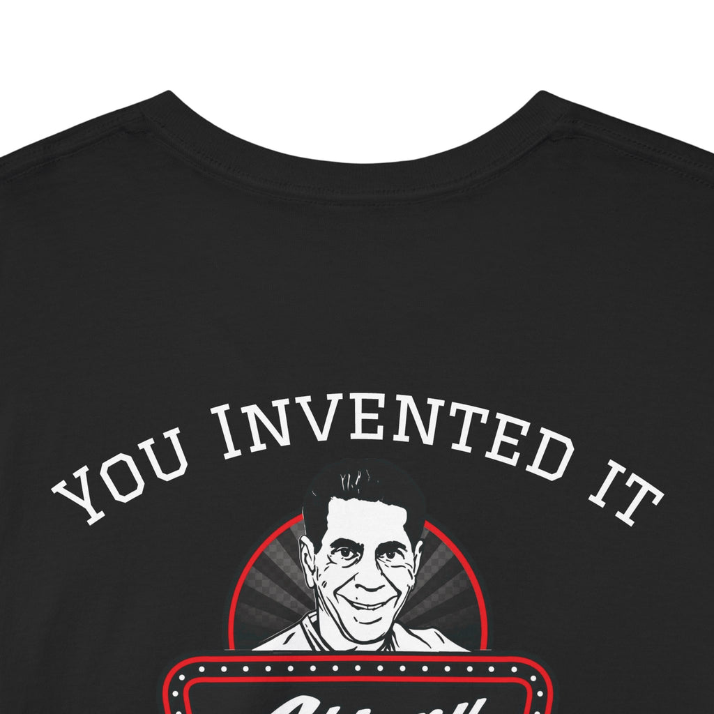 Black t-shirt with a graphic of a smiling man and text 'YOU INVENTED IT' on a white background