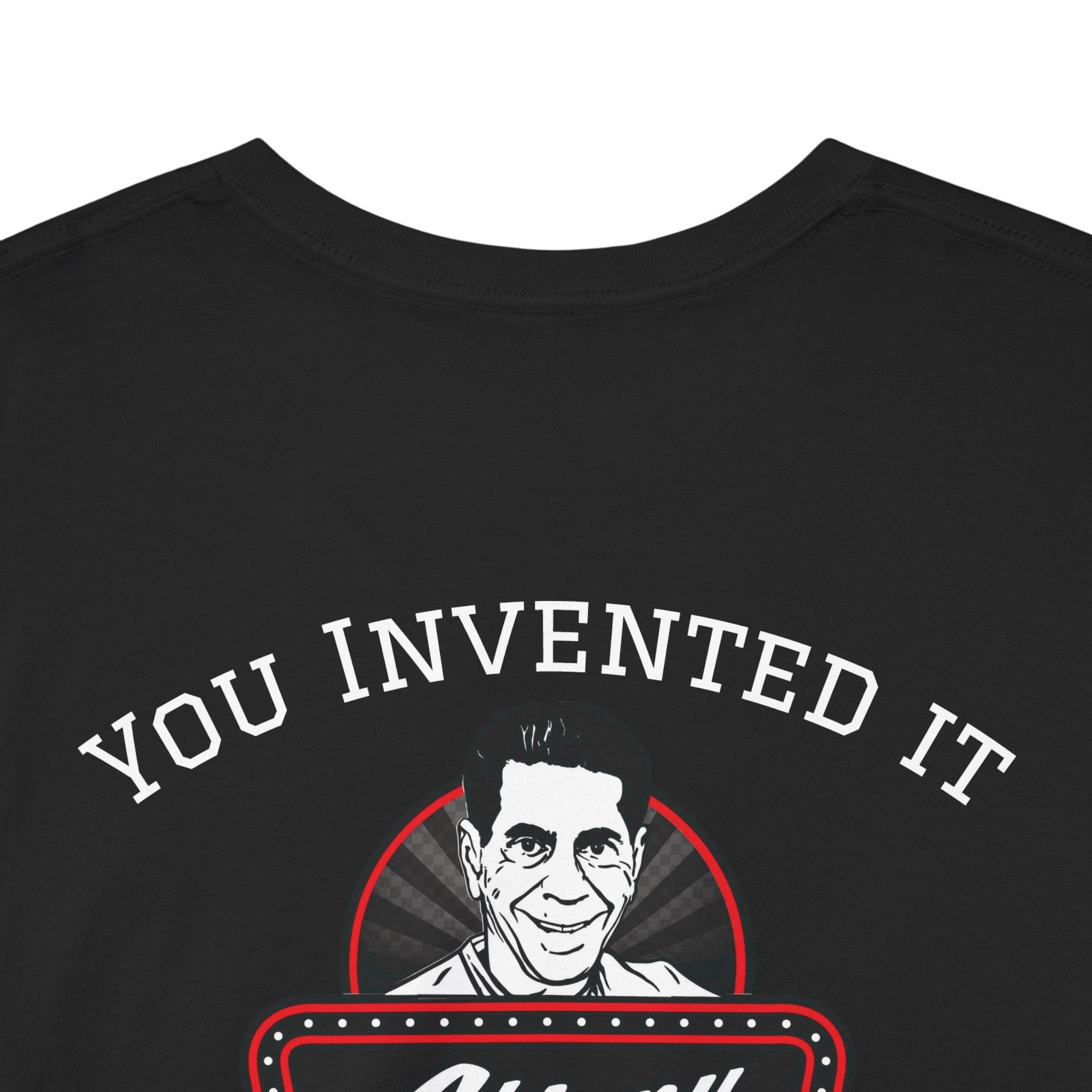 Black t-shirt with a graphic of a smiling man and text 'YOU INVENTED IT' on a white background
