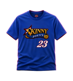 A royal blue short-sleeve t-shirt with a graphic on the chest reading 'SKINNY JOEYS' in gold and white, with a star and scroll design, and the number '23' below in white with a red outline. A small red and white Nike logo is visible inside the collar.