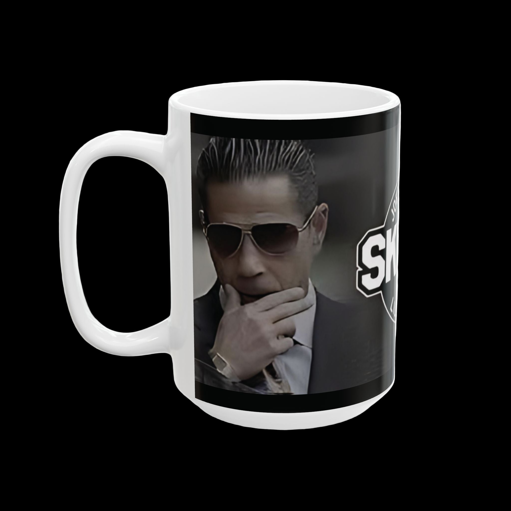 Mug with a graphic of a person in a suit and sunglasses on a black background, featuring the word 'SHARKS'.