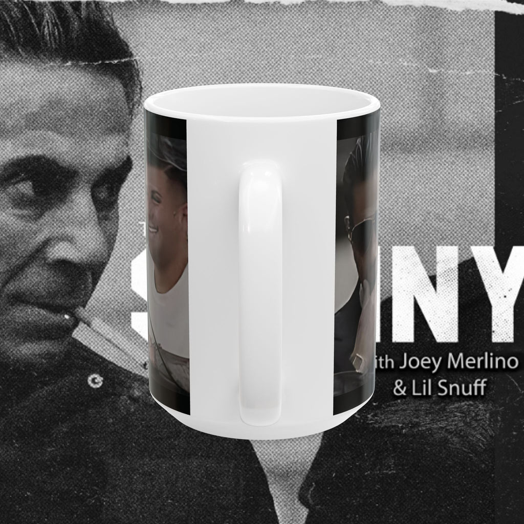 White mug with a black and white photo of a man on a gray background with text.