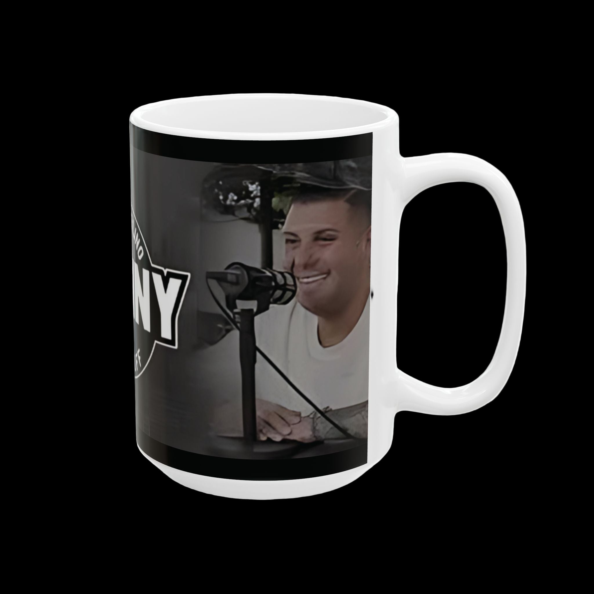 Mug with a person smiling and a microphone on a black background, featuring the text 'Radio City'.