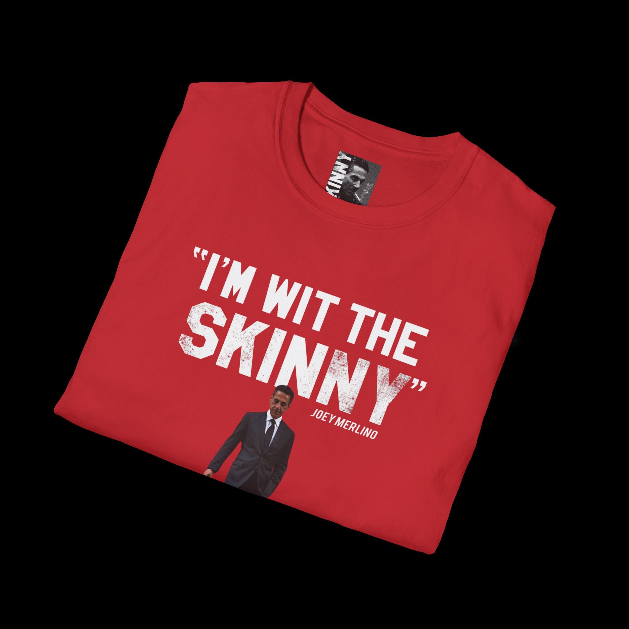 Folded red t-shirt with white text and graphic on a black background