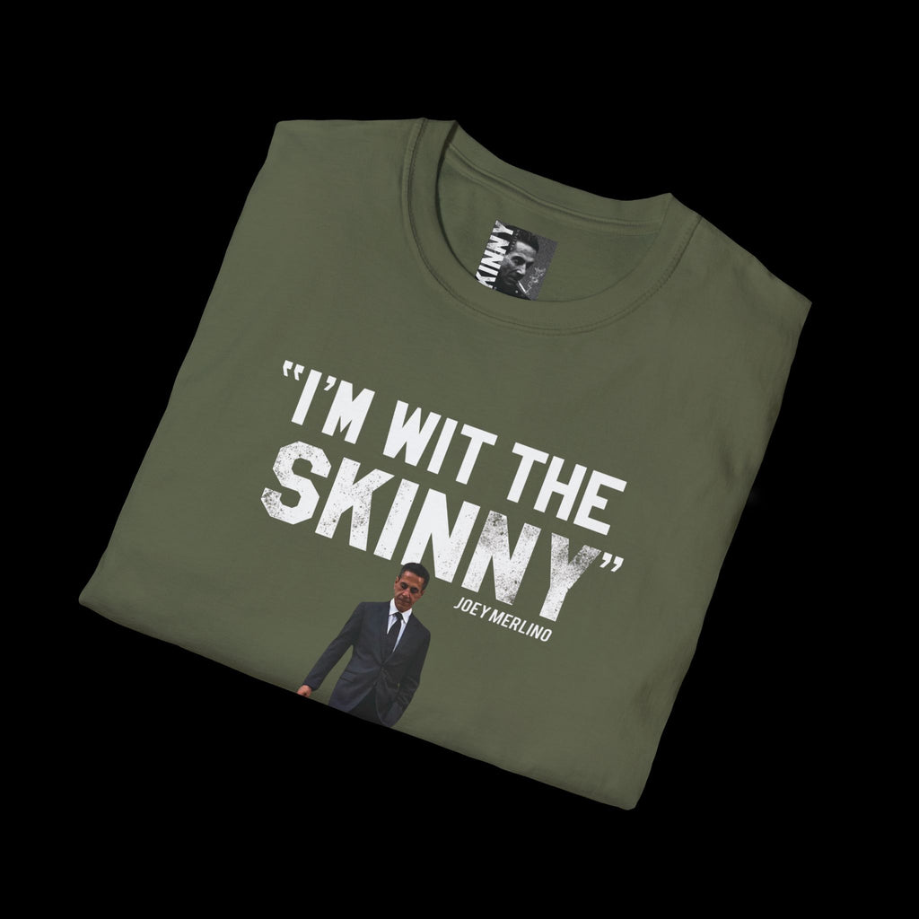 Folded green t-shirt with 'I'm wit the skinny' text and a graphic of a man in a suit on a black background.