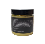 Jar of lotion with black label on a white background