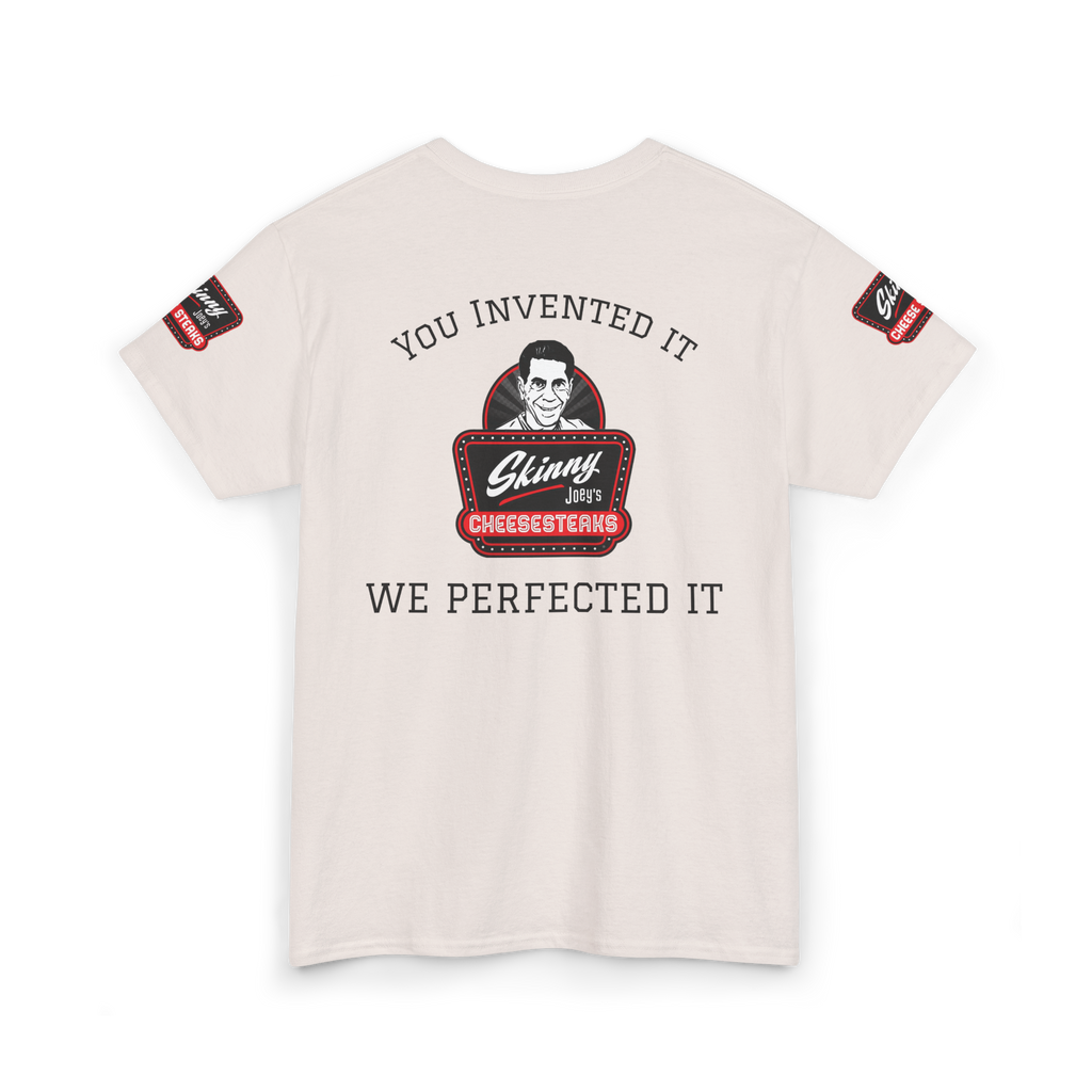 Beige t-shirt with graphic design and text on a white background