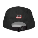 Black cap with a logo on the back against a white background