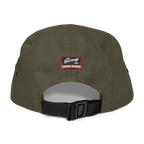 Green cap with a logo on the back against a white background