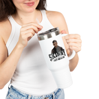 Person holding a mug with a graphic design on a white background