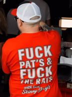 Customer in a white cap wearing the red Fuck Pat's & Fuck The Rats tee, back view