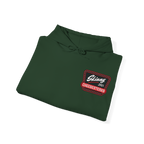 Folded green hoodie with a logo on a white background