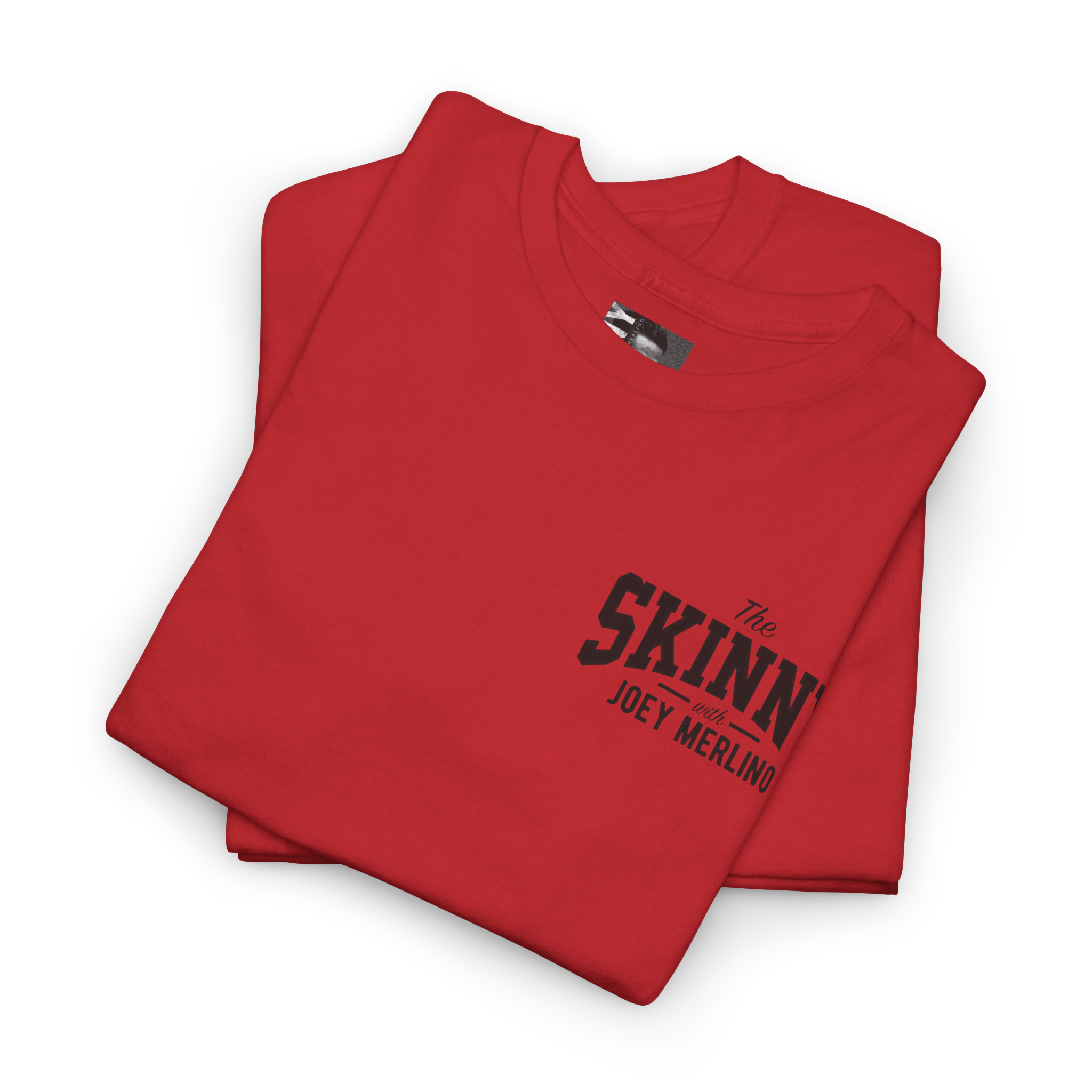 Folded red t-shirt with 'The Skinn' text on a white background