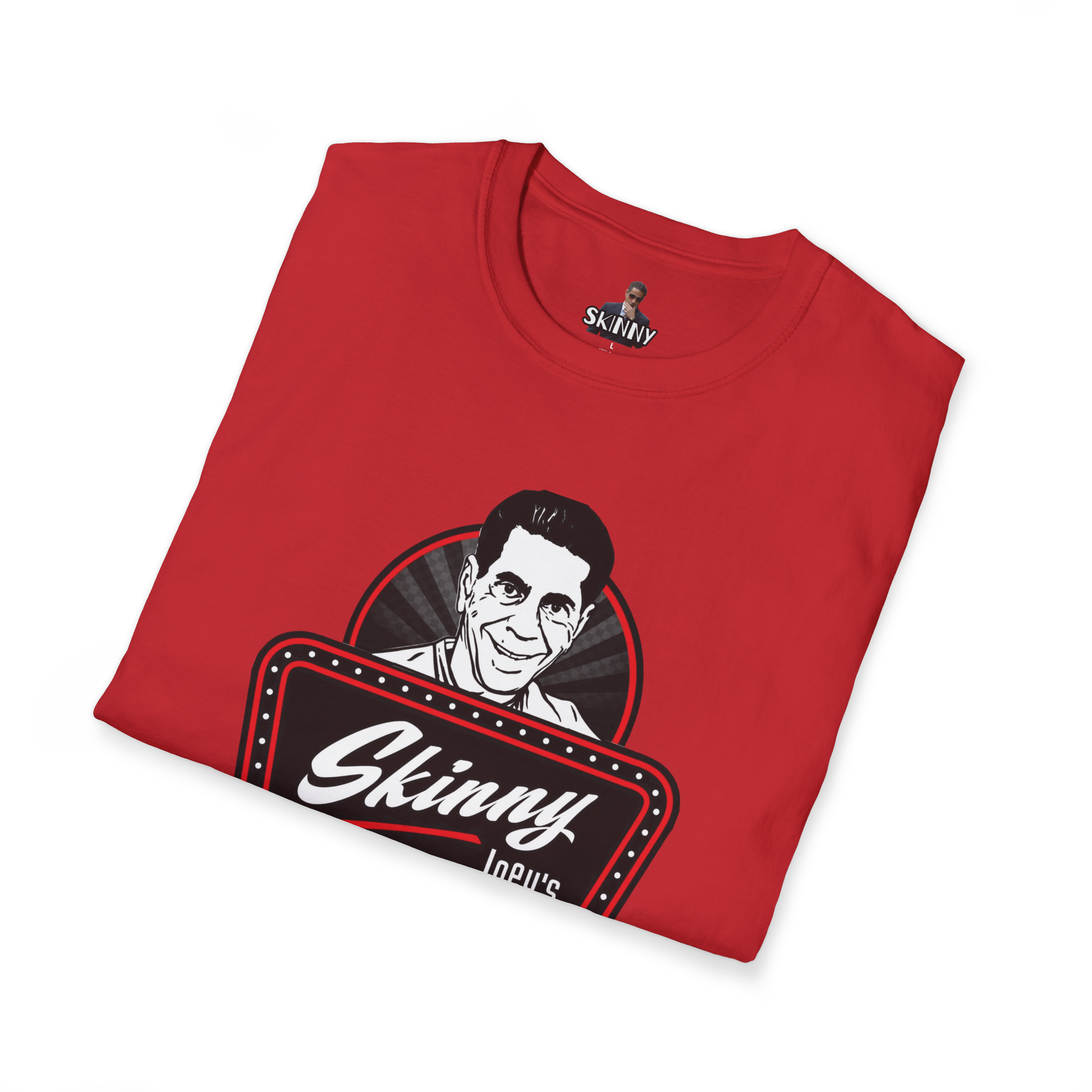 Folded red t-shirt with 'Skinny' graphic design on a white background