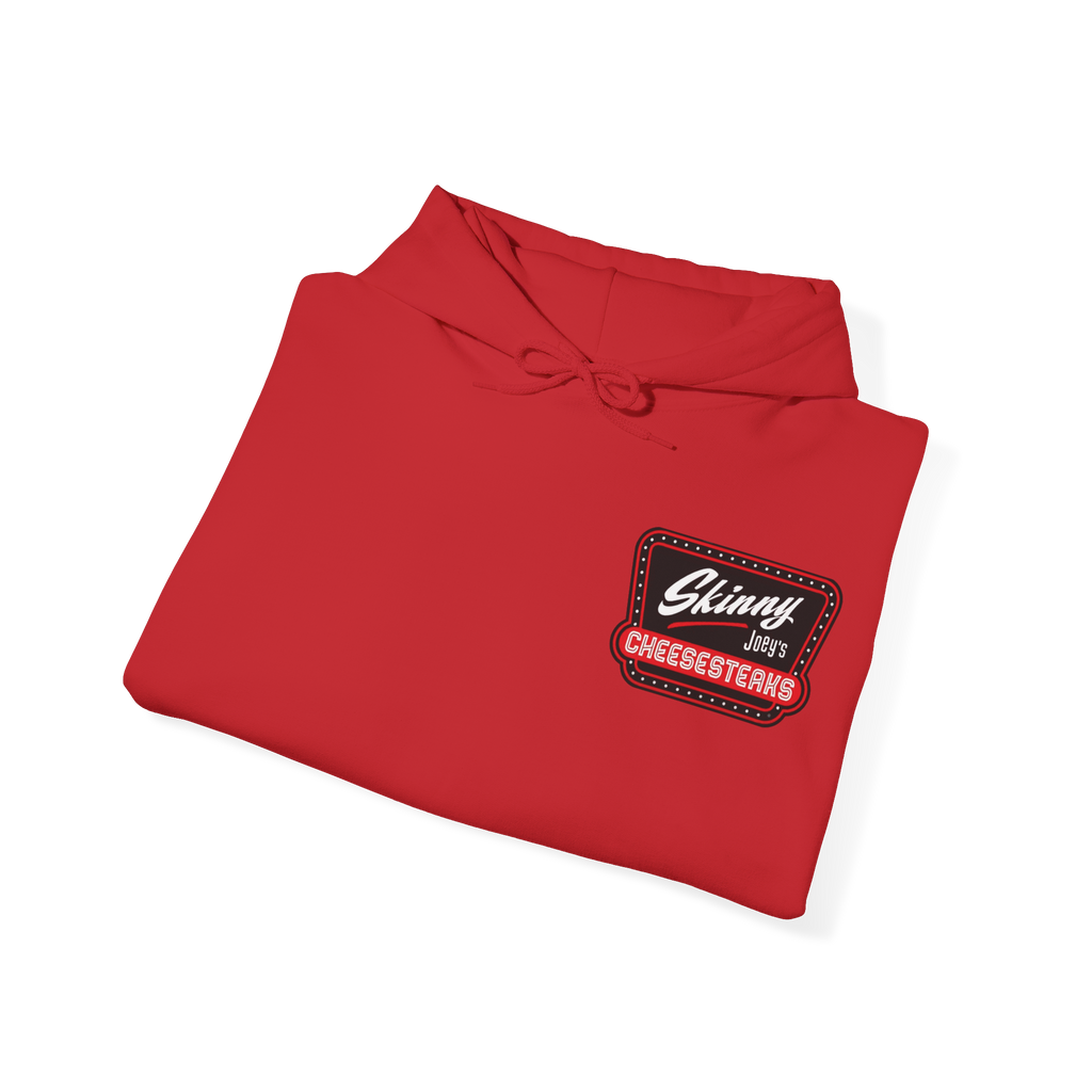 Folded red shirt with a logo on a white background