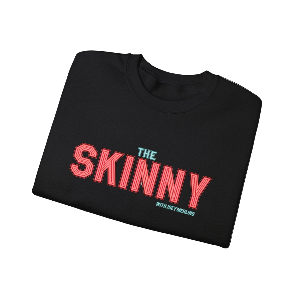 Folded black t-shirt with 'The Skinny' text on a white background