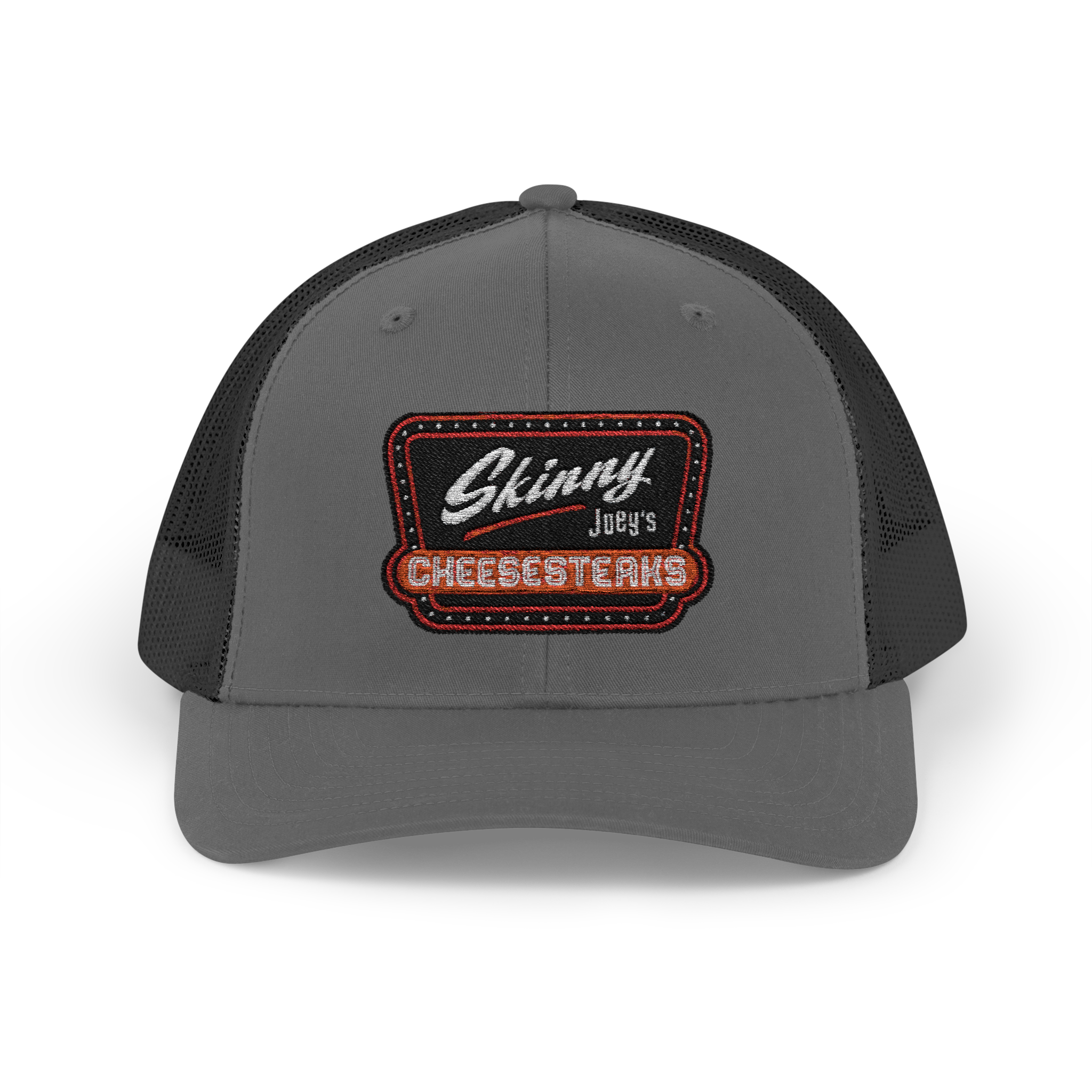 Gray trucker cap with a black mesh back and embroidered patch on a white background