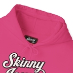 Pink hoodie with 'Skinny Jeans' text and brand label on a white background