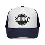 White and navy trucker hat with 'Skinny' logo on a white background