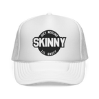 White trucker cap with black logo and text on a white background