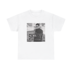 White t-shirt with a graphic of a person wearing sunglasses and text on a white background