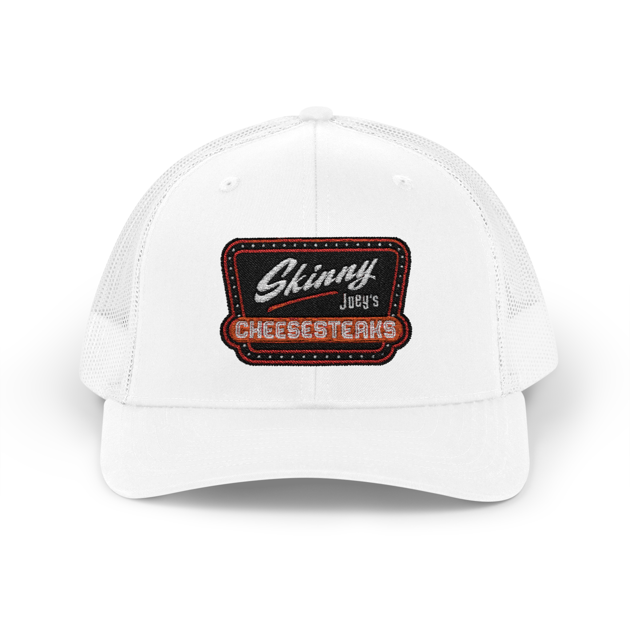 White cap with a patch reading 'Skinny Joey's Cheesesteaks' on a white background