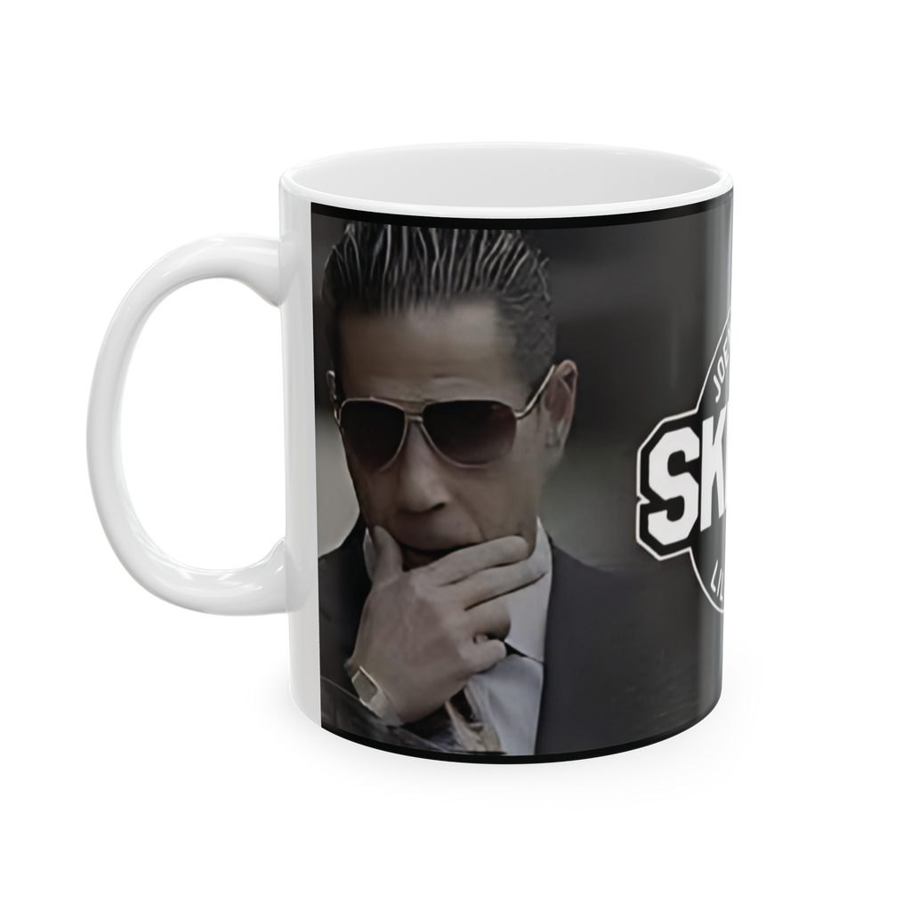 Mug with a graphic of a person in a suit and sunglasses, featuring the word 'SKY'.