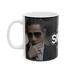 Mug with a graphic of a person in a suit and sunglasses, featuring the word 'SKY'.