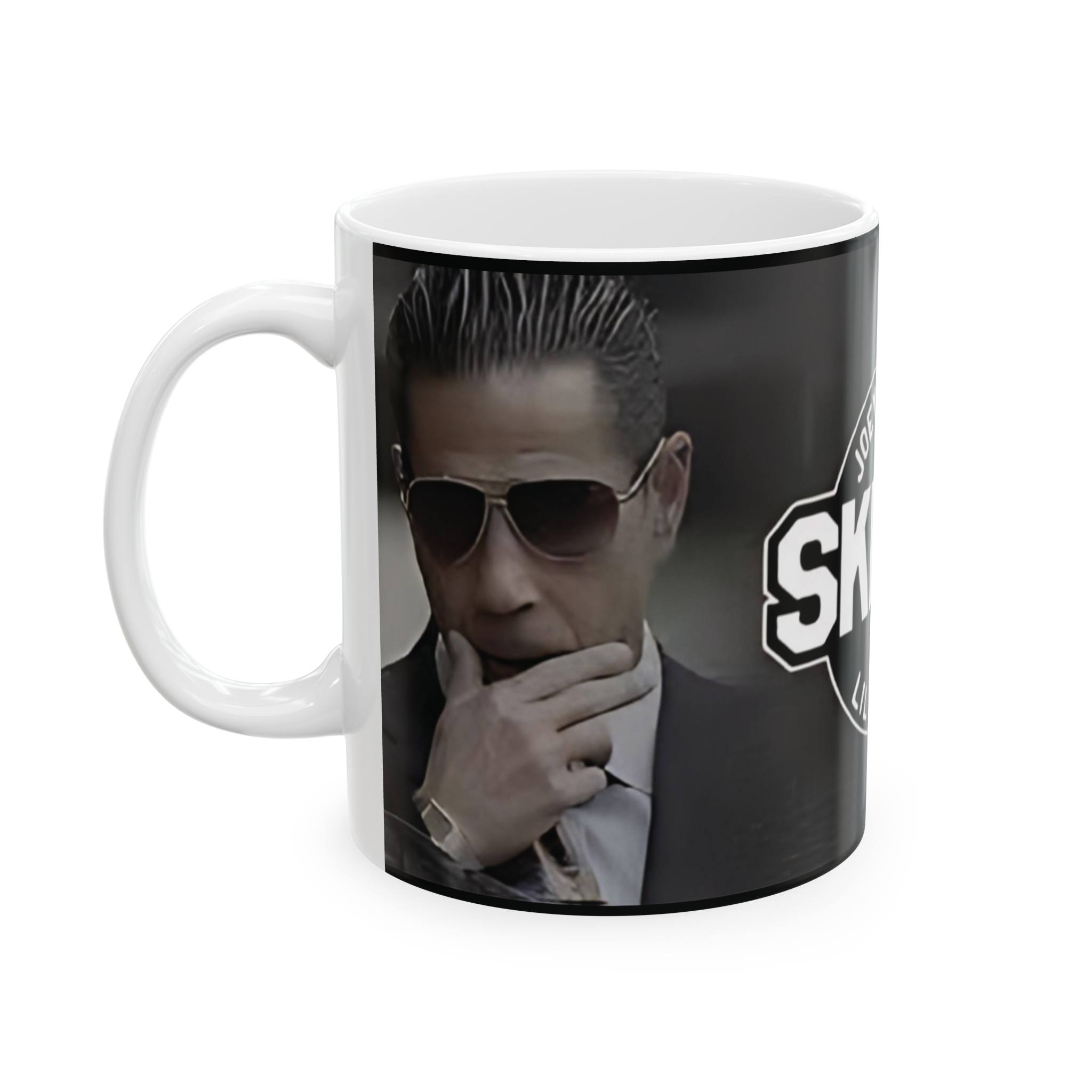 Mug with a graphic of a person in a suit and sunglasses, featuring the word 'SKY'.