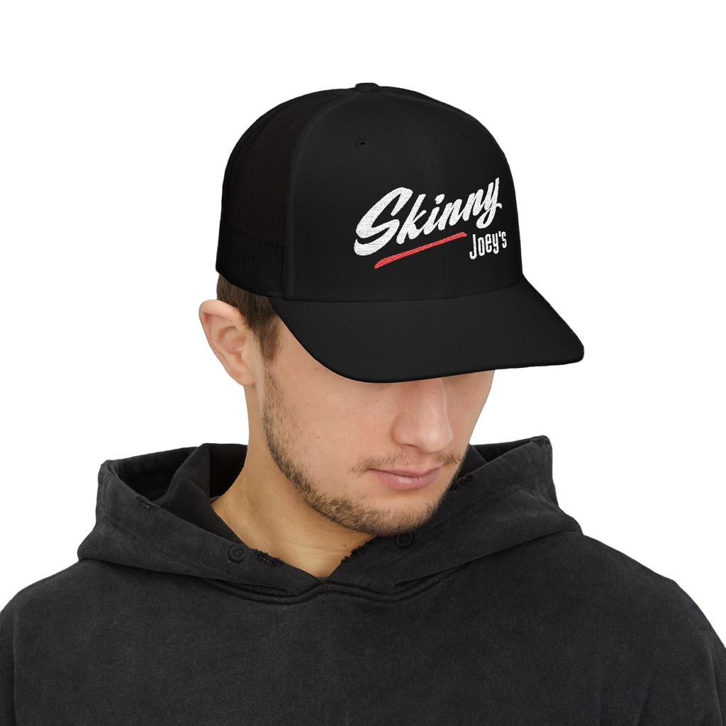 Man wearing a black cap with 'Skinny Joey's' logo on a white background