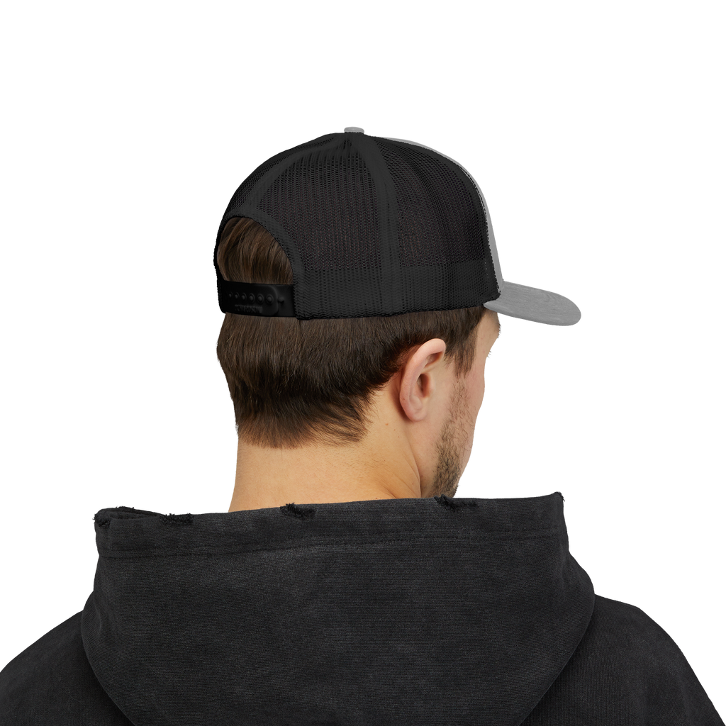 Person wearing a black and gray cap from behind on a white background