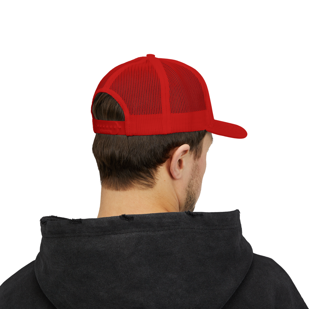 Person wearing a red cap and black hoodie on a white background