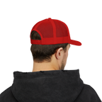 Person wearing a red cap and black hoodie on a white background