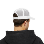 Person wearing a white mesh cap and black hoodie on a white background