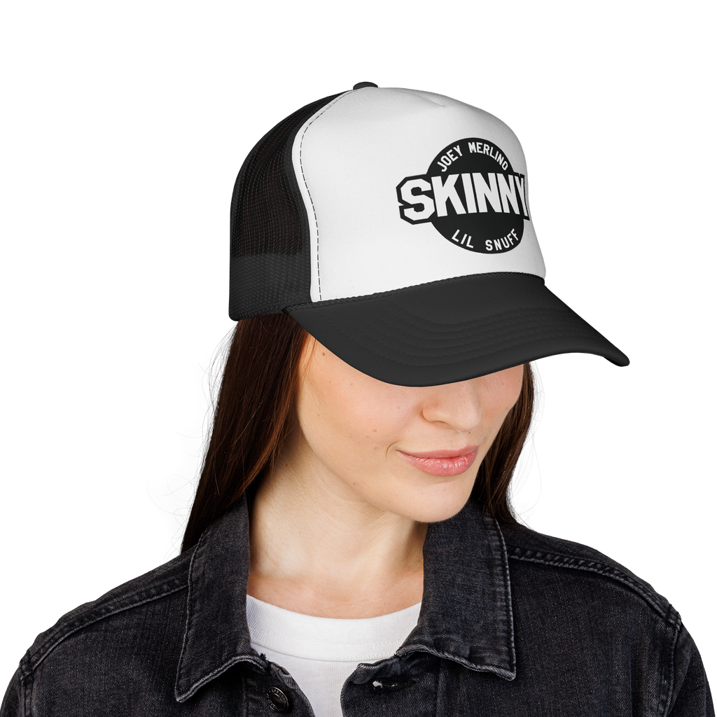 Person wearing a black and white cap with 'Skinny' branding on a white background