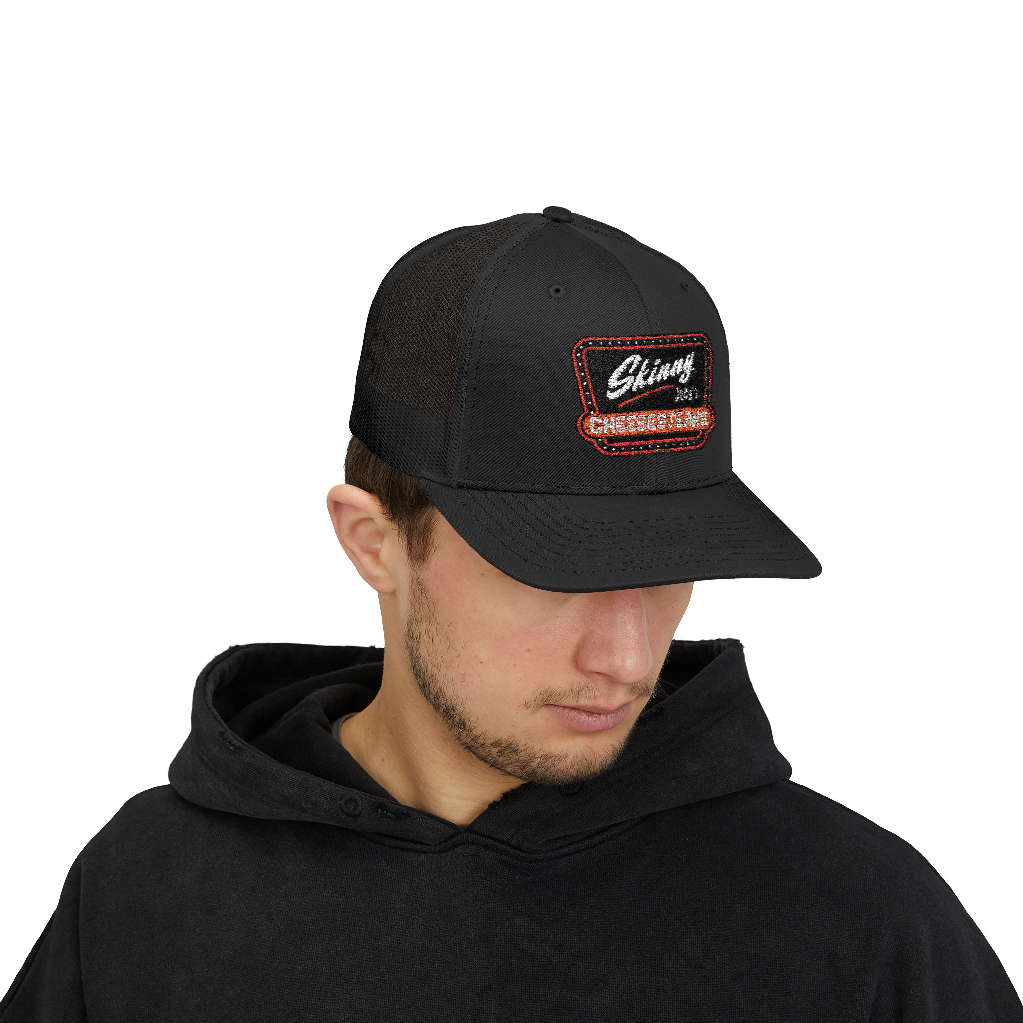 Person wearing a black cap with a logo on a white background