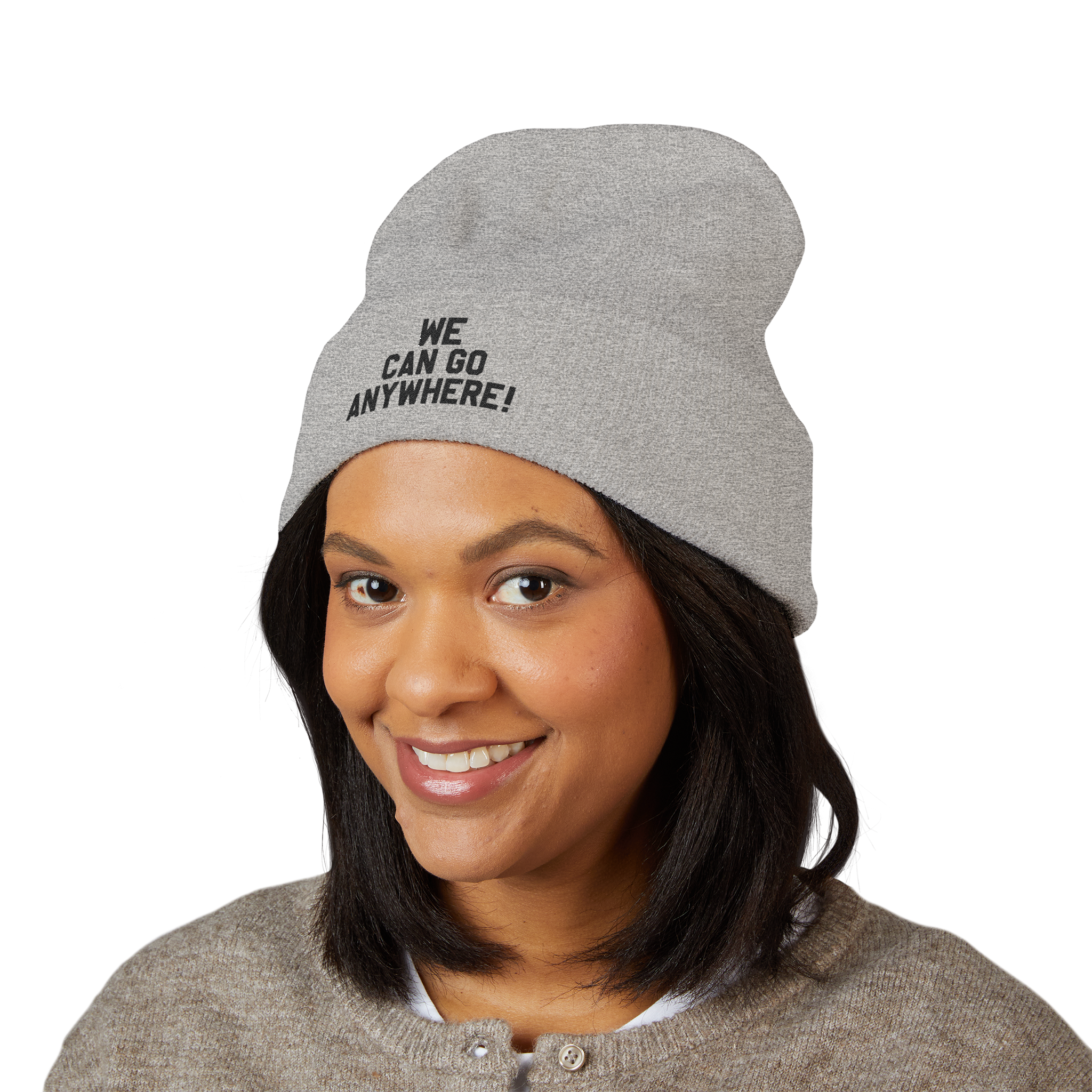 Person wearing a gray beanie with 'WE CAN GO ANYWHERE!' text on a white background