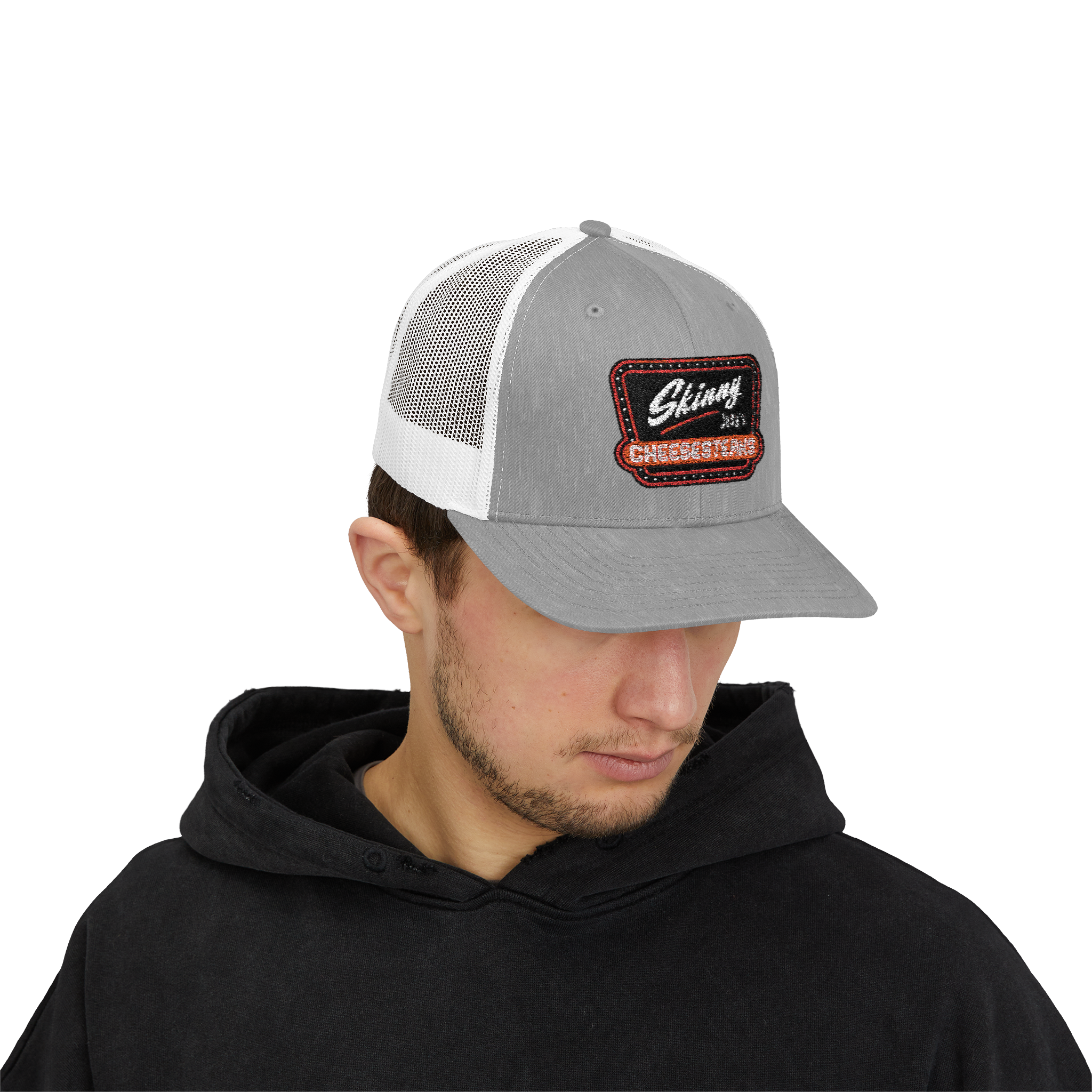 Man wearing a gray and white trucker hat with a logo on a white background