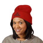 Person wearing a red beanie with 'WE CAN GO ANYWHERE!' text on a white background