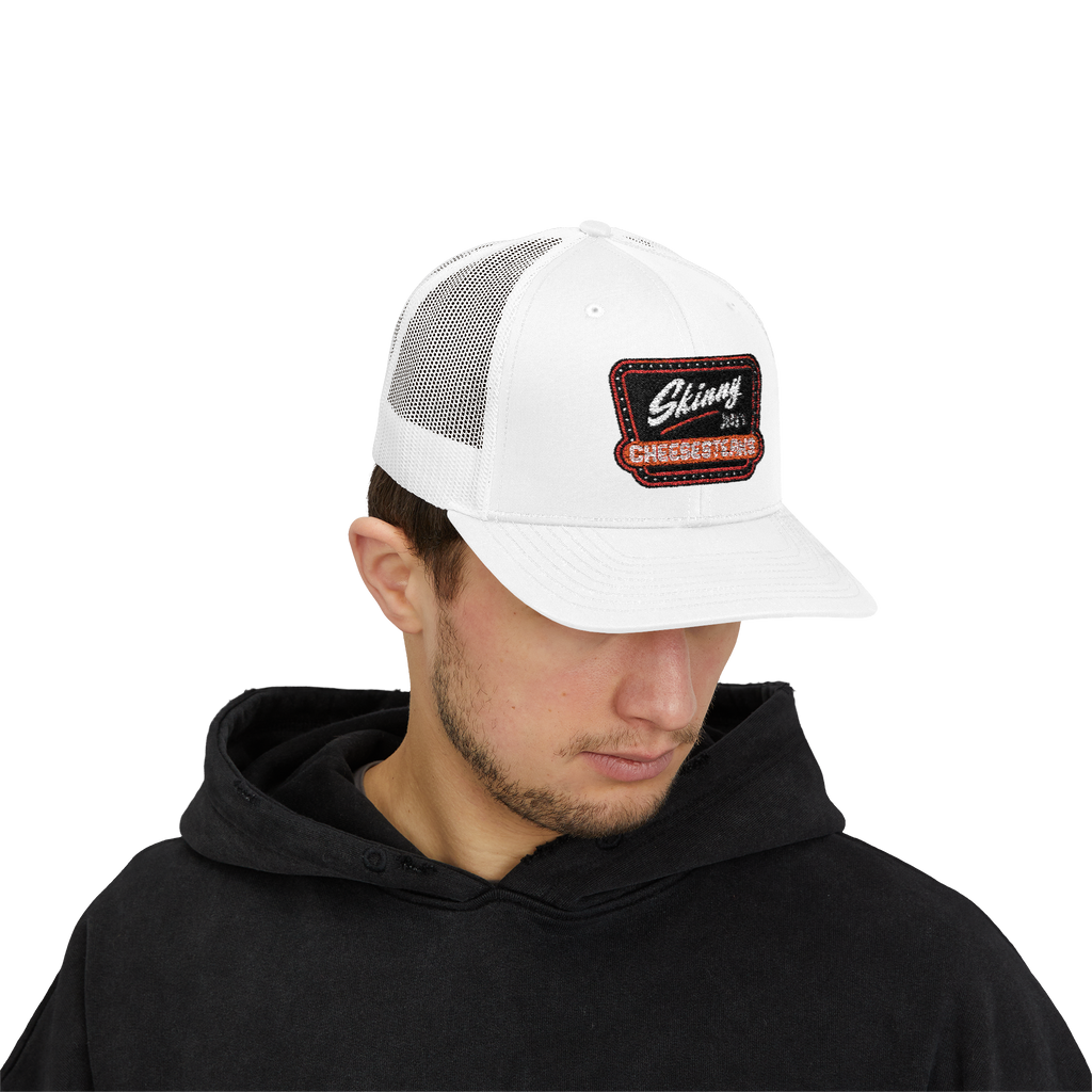 Man wearing a white trucker cap with a logo on a white background
