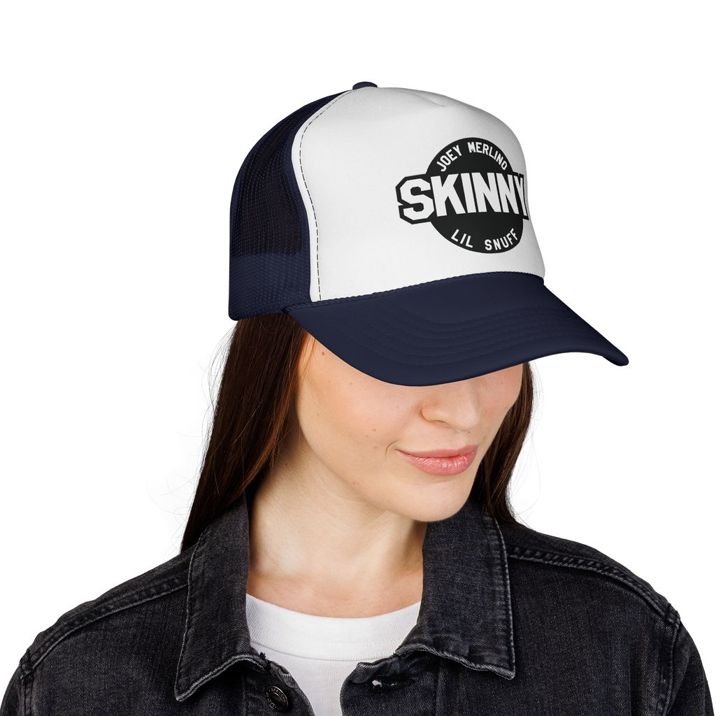 Person wearing a black and white cap with 'Skinny' branding on a white background