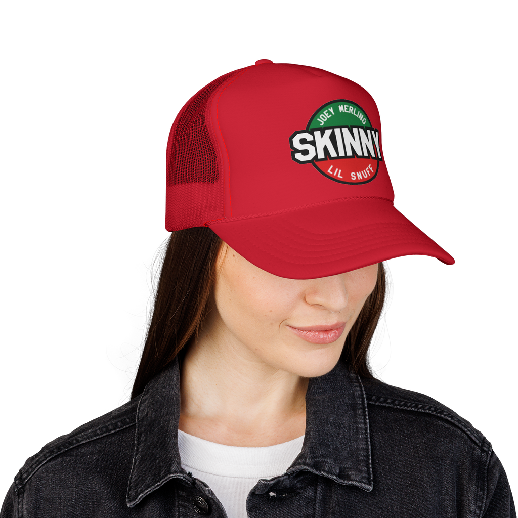 Red cap with 'Skinny' logo worn by a person on a white background