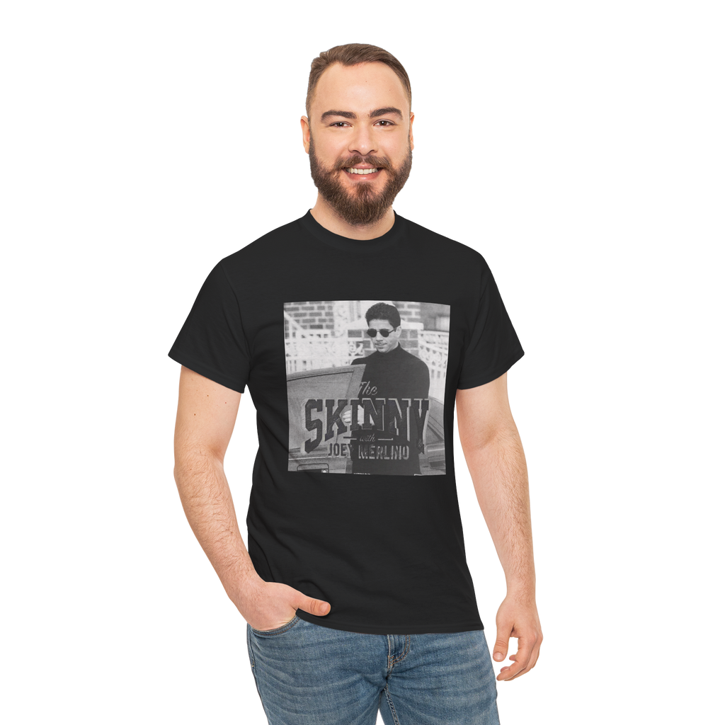 Man wearing a black t-shirt with a graphic design on a white background