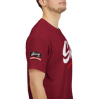 Red t-shirt with a logo on the sleeve worn by a person